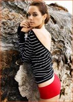 GINA HOLDEN